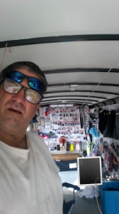 Craig Wilusz with his truck loaded with GPS gear.